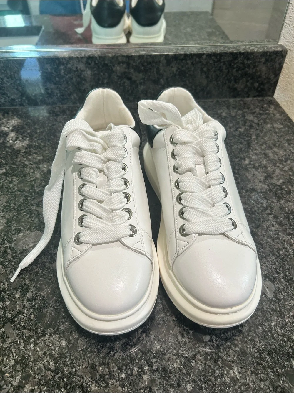 Steve Madden White Low-Top Platform Sneakers with Black Heel Accent